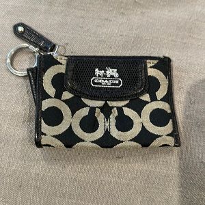 Coach change/card holder pouch with pocket and keychain.